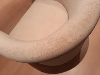 Butaca de tela Ikea color beige.