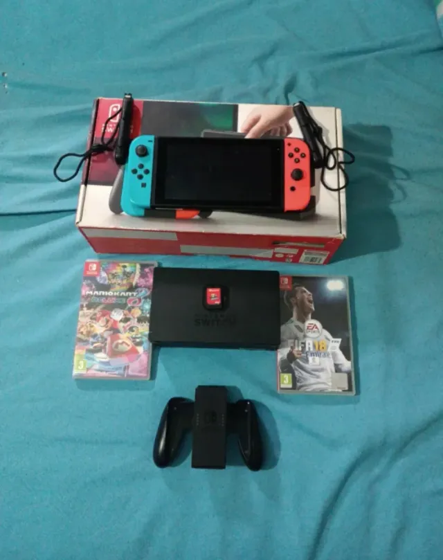 Nintendo Switch con 3 juegos y accesorios