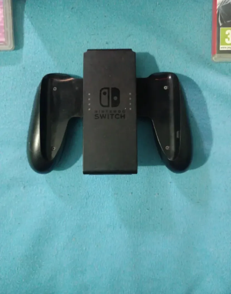 Nintendo Switch con 3 juegos y accesorios afbeelding 4