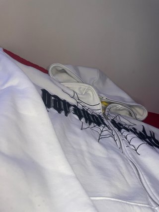 Felpa bianca con zip e grafica ragno taglia m