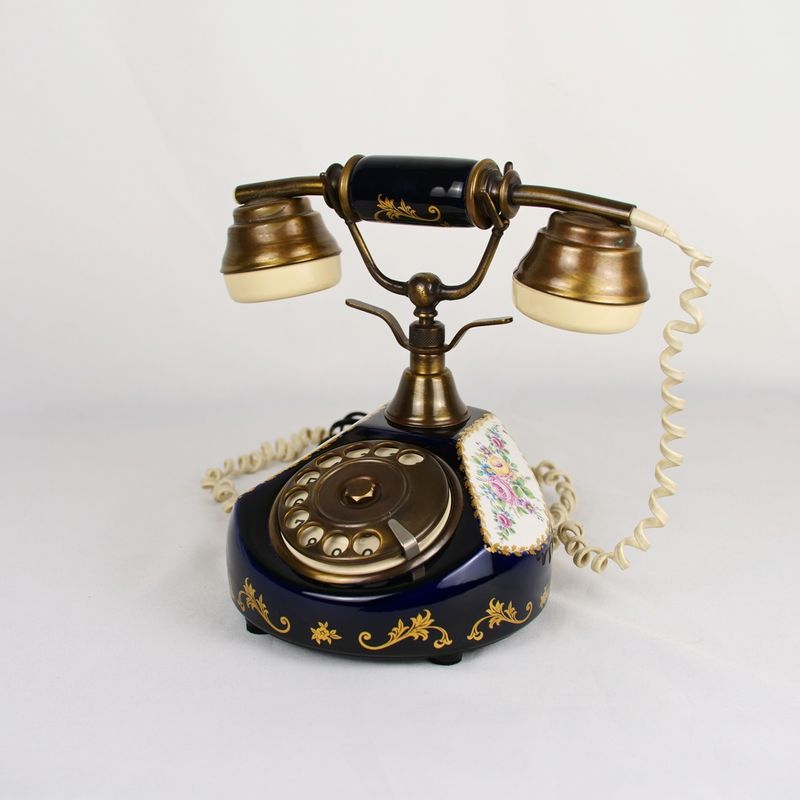 Teléfono de disco en cerámica con decoración floral