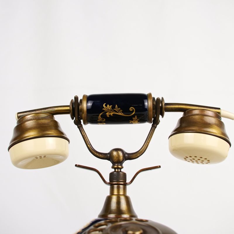 Teléfono de disco en cerámica con decoración floral afbeelding 8