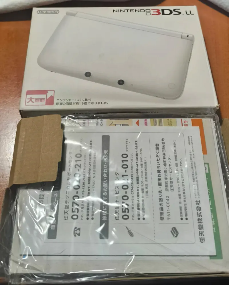 Nintendo 3DS XL con juegos y caja original afbeelding 2