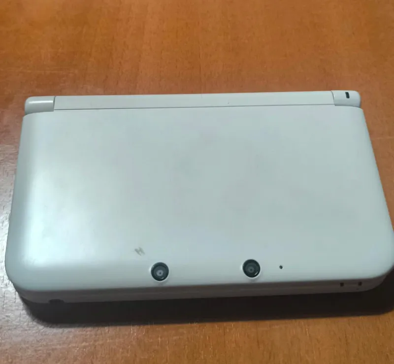 Nintendo 3DS XL con juegos y caja original afbeelding 5