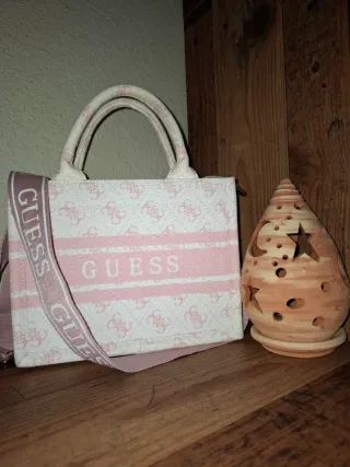 Bolso de mano Guess rosa y blanco