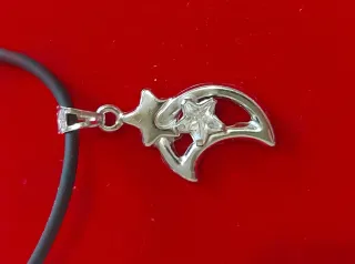 Ciondolo  lun oro bianco 750 con zircone