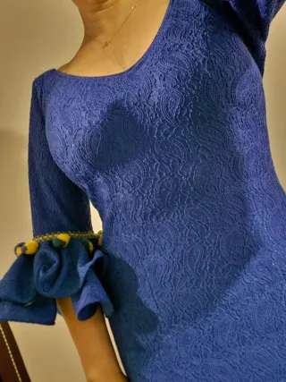 Traje o vestido de flamenca azul con volantes