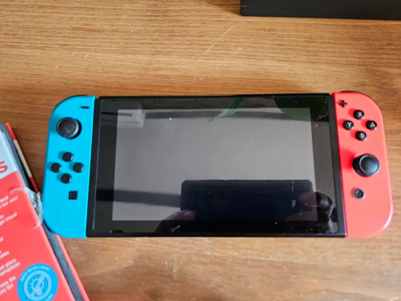 Nintendo Switch Azul/Rojo + Accesorios afbeelding 3