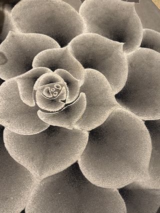 Alfombra diseño floral gris y blanco