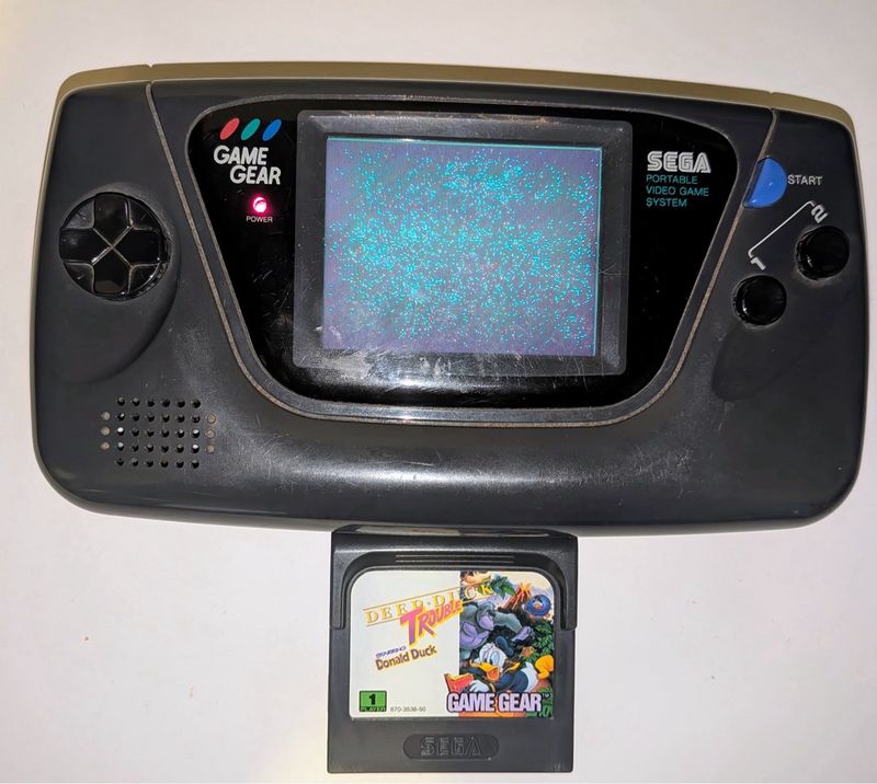 Sega Game gear + Juego para piezas o reparar
