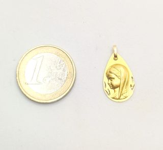 Colgante Niña de oro de 18k, 1.32 g.