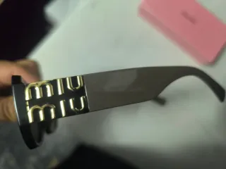 Gafas de sol Miu Miu rosas y marrones