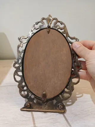 Marco de bronce ovalado antiguo