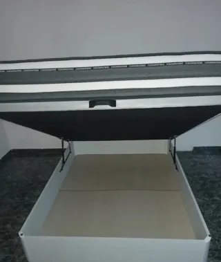 Canapé abatible con base tapizada