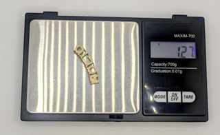 Colgante Rocio de oro de 18k, 1.27 g.