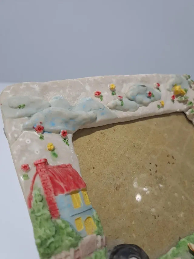 Marco de fotos y recipiente cerámica