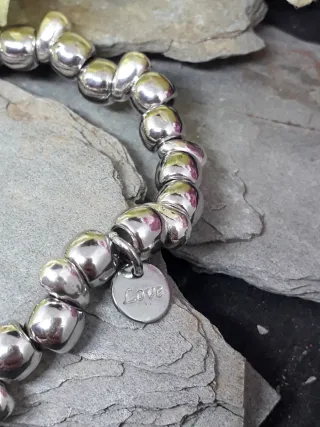 Pulsera elástica con charms