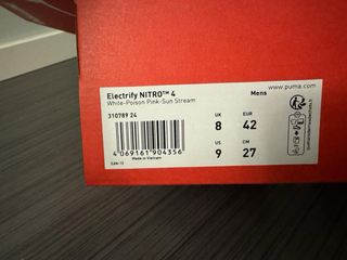 Zapatillas running Puma hombre blancas y naranjas