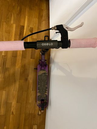 Patinete Oxelo morado con freno