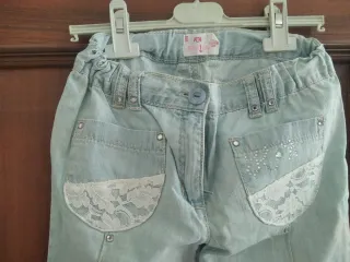 Jeans bambina azzurri con pizzo