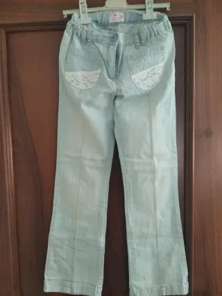 Jeans bambina azzurri con pizzo