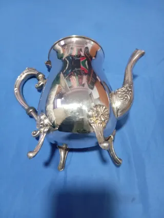 Juego de teteras de metal plateado