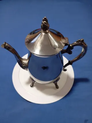 Juego de teteras de metal plateado