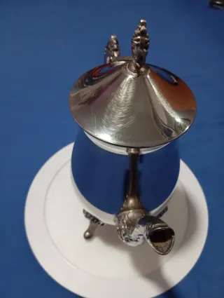 Juego de teteras de metal plateado