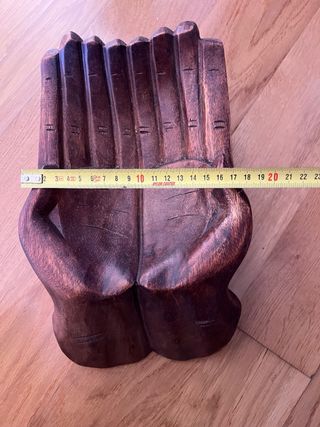 Vaciabolsillos con forma de mano