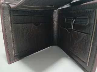 Lote  9 Carteras de hombre.