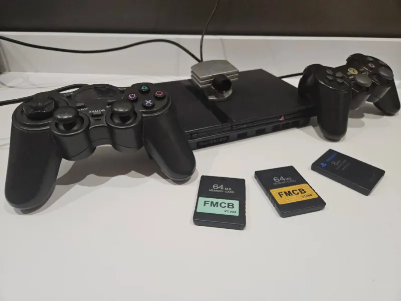 Ps2 Slim + 3 Memory Cards + 2 Mandos + Cámara