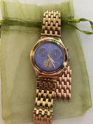 Reloj Swatch esfera grande azul y dorado