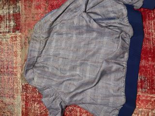 Chaqueta bomber EFE de cuero azul y gris