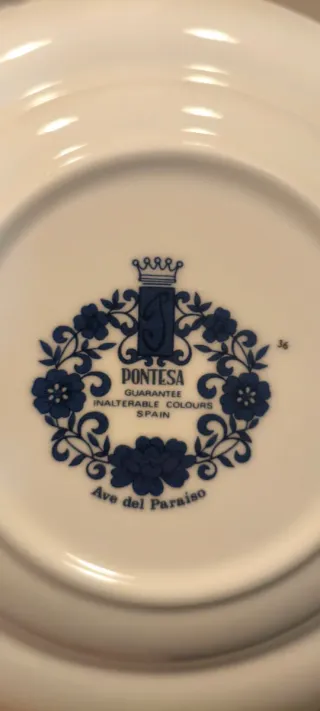 Juego de 7 platos de porcelana ave del paraíso