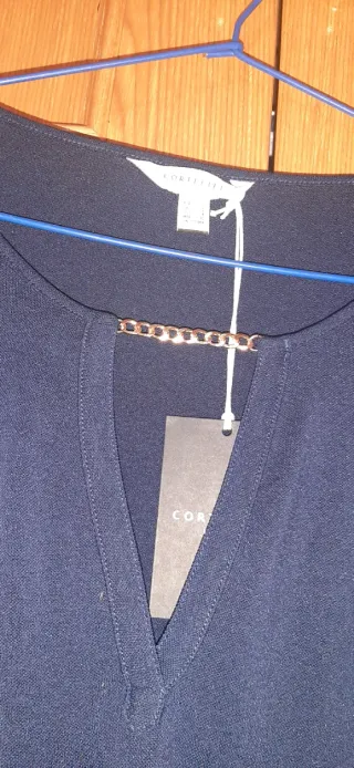 Blusa Cortefiel azul con cadena