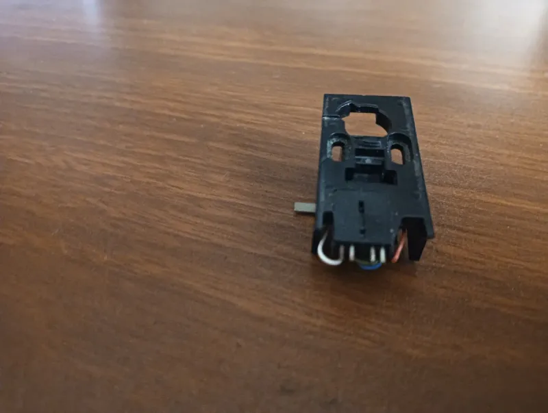 Portacápsulas y cápsula para tocadiscos