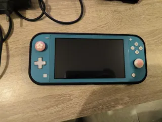 Nintendo Switch Lite Turchese + Custodia e accessori