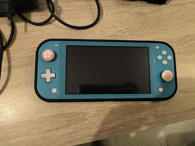 Nintendo Switch Lite Turquesa + Funda y accesorios afbeelding 4