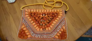 Bolso de fiesta naranja con pedrería