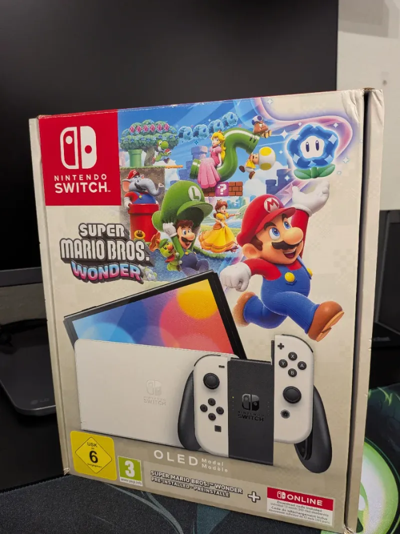Nintendo Switch OLED Blanca + Juegos y Funda. afbeelding 5