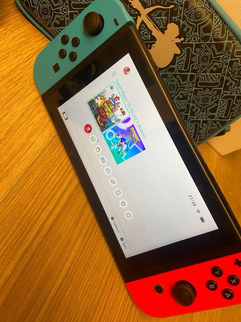 Nintendo Switch completo con funda y Minecraft afbeelding 2