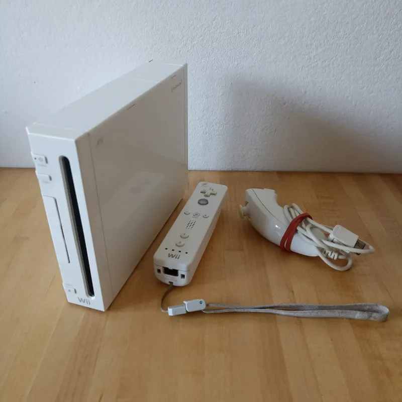 Consola Wii Blanca + Control remoto Wii y Nunchuk Perfecto