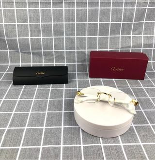 Gafas Cartier blanco y dorado