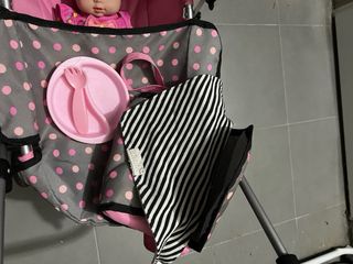 Carrito de muñeca con muñeca