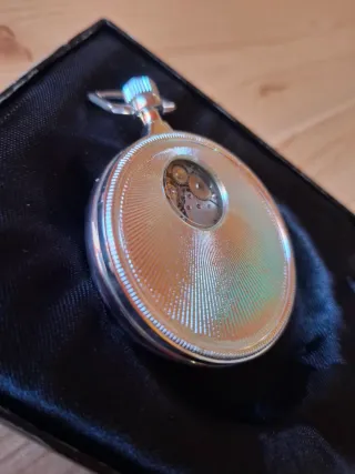 Reloj de bolsillo bañado en plata