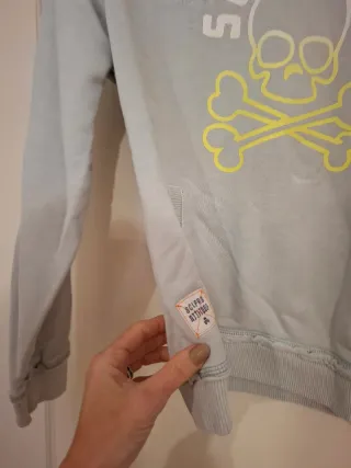 Sudadera Scalpers Calavera y Tibias Cruzadas