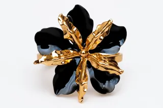 Pulsera flor negro y dorado elegante | Joyería