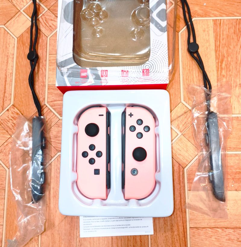 2 Joypads nuevos rosados compatibles inalambricos