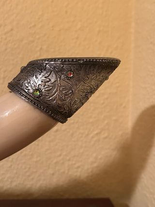 Diente de mamut vintage con elefantes