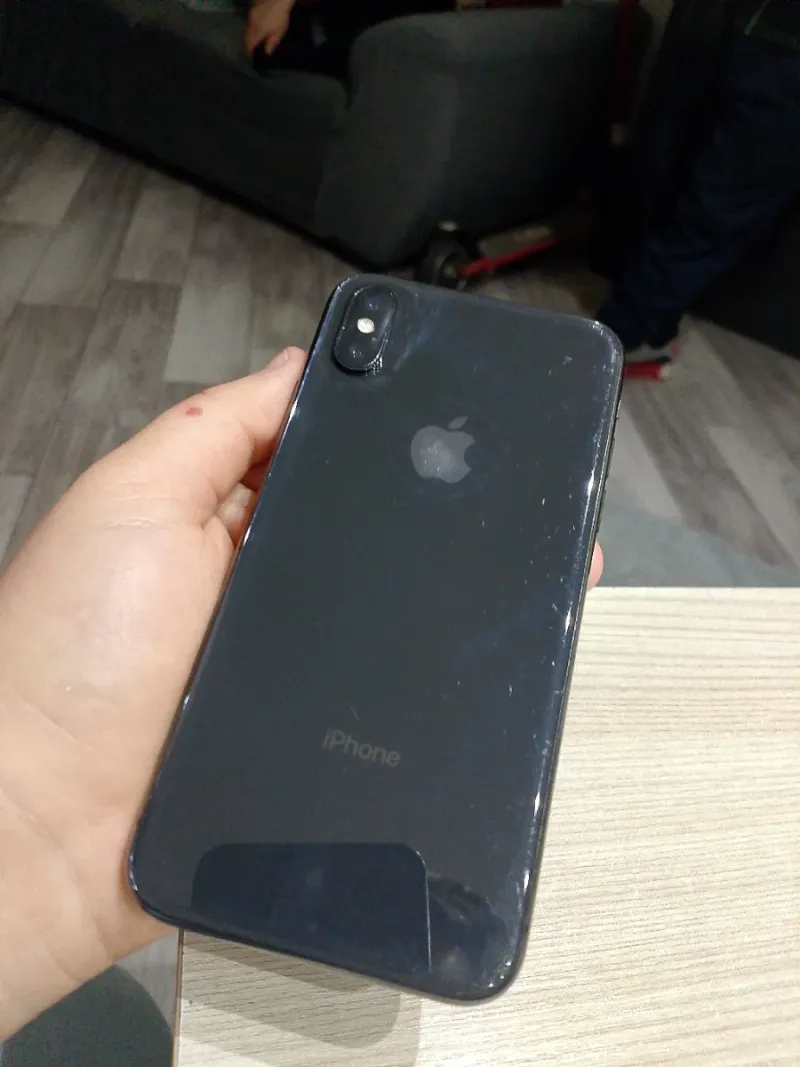 iPhone X Negro con funda azul afbeelding 4